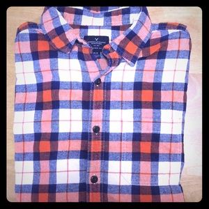 Long sleeve button down flannel feel shirt .